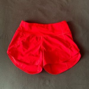 red lululemon shorts